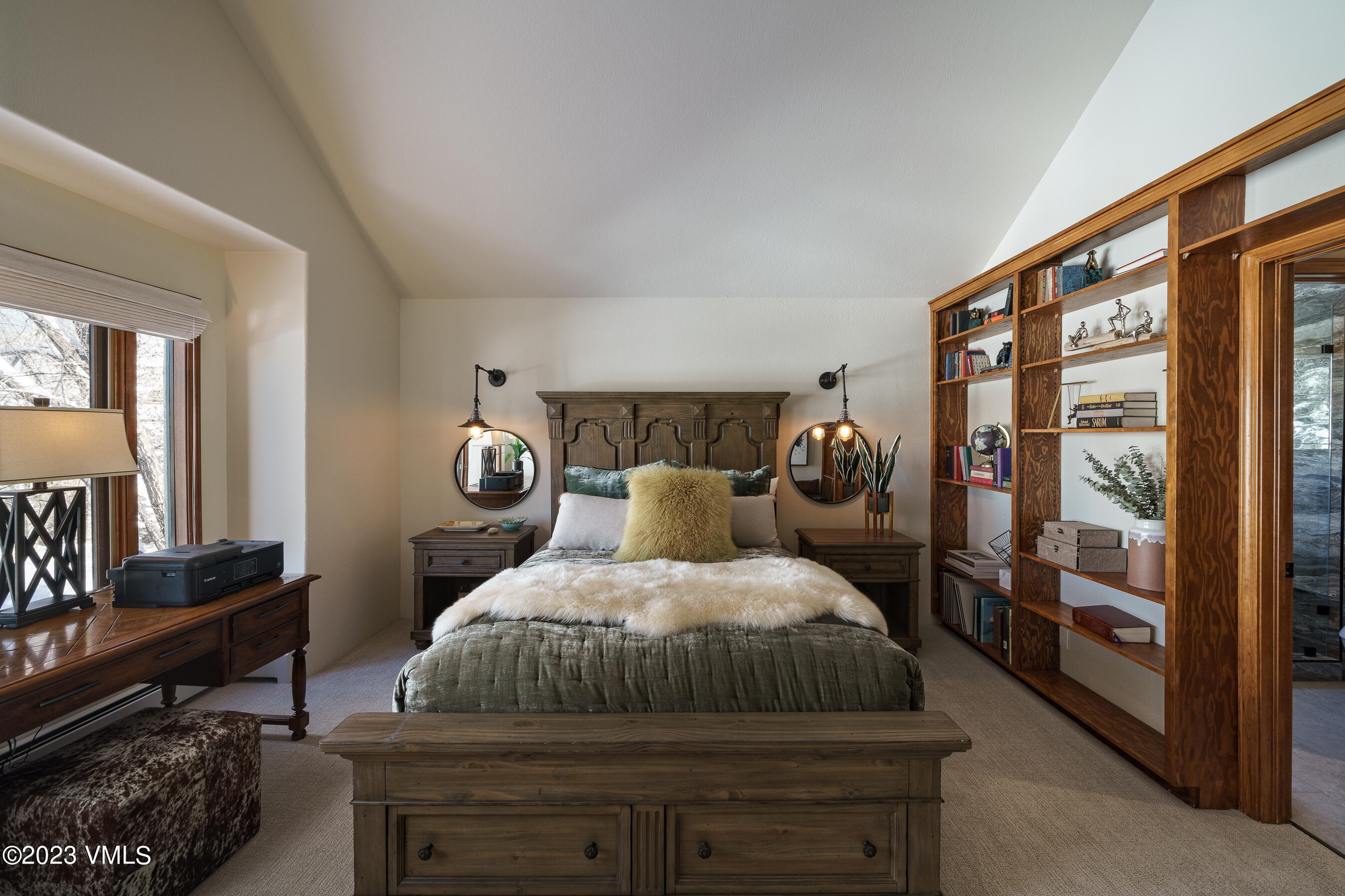 176 Windermere Circle Edwards, CO 81632 - Photo 25 of 42 a bedroom with a bed and window