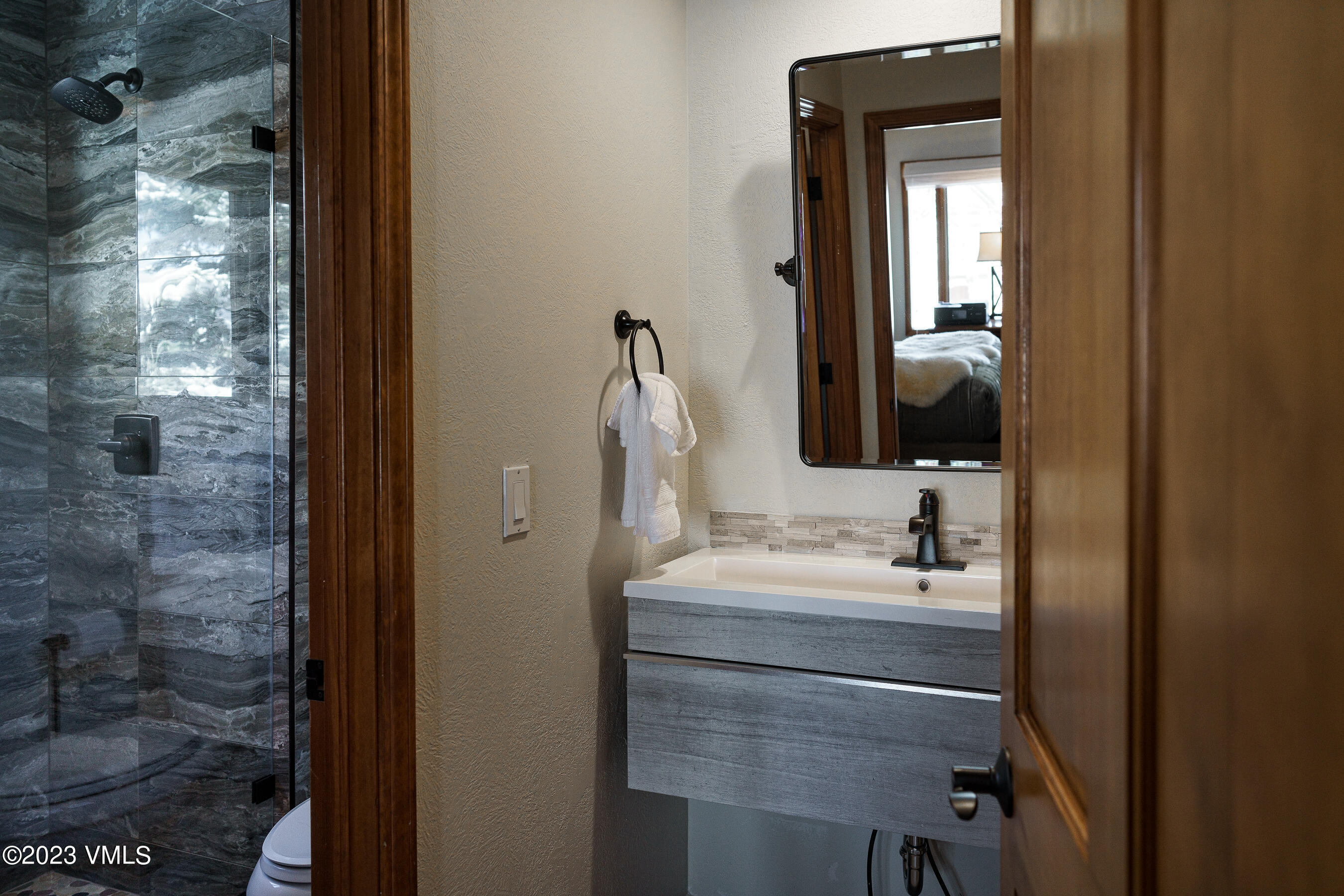 176 Windermere Circle Edwards, CO 81632 - Photo 32 of 42 a bathroom with a sink and a mirror