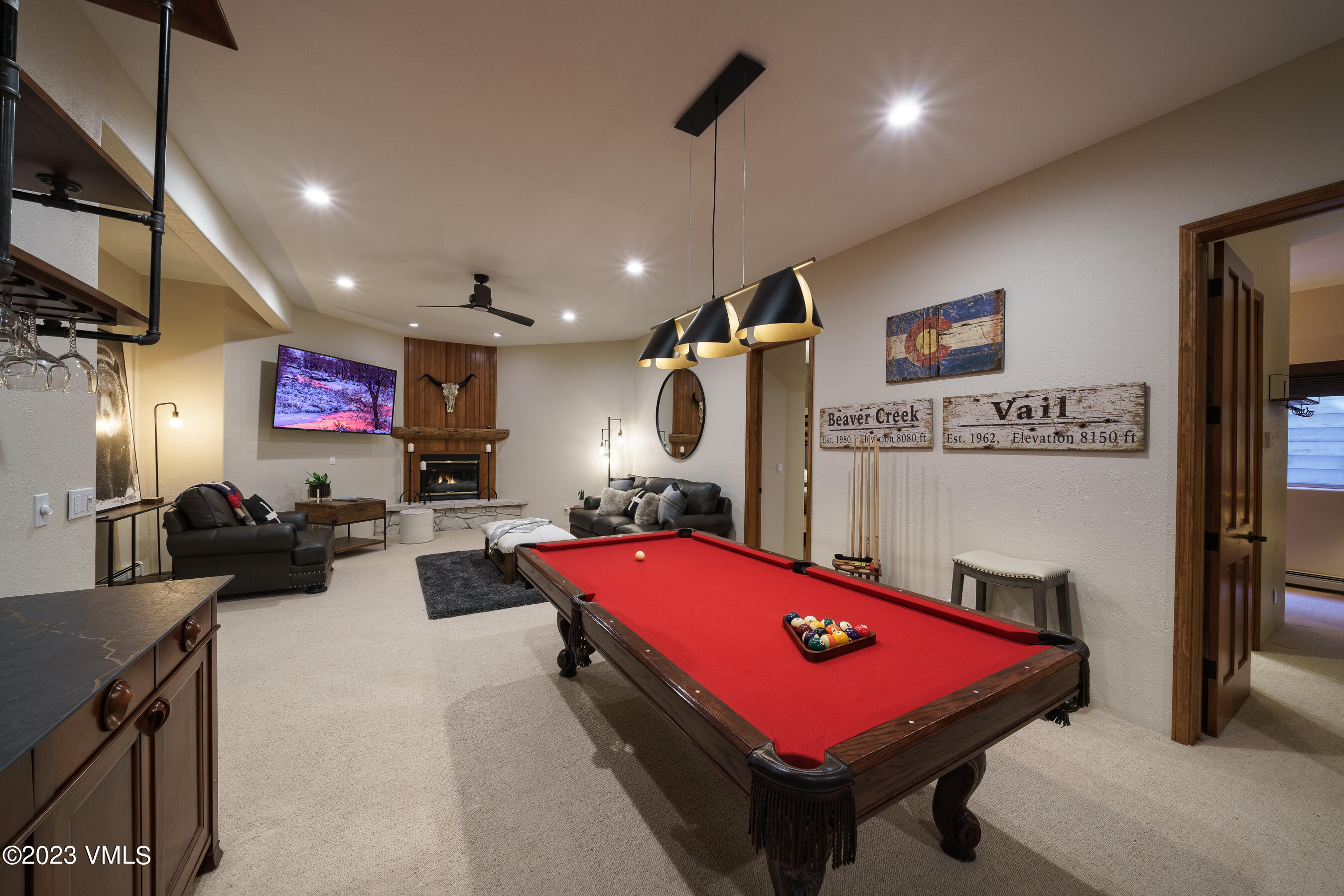 176 Windermere Circle Edwards, CO 81632 - Photo 38 of 42 a room with gym equipment and a flat screen tv