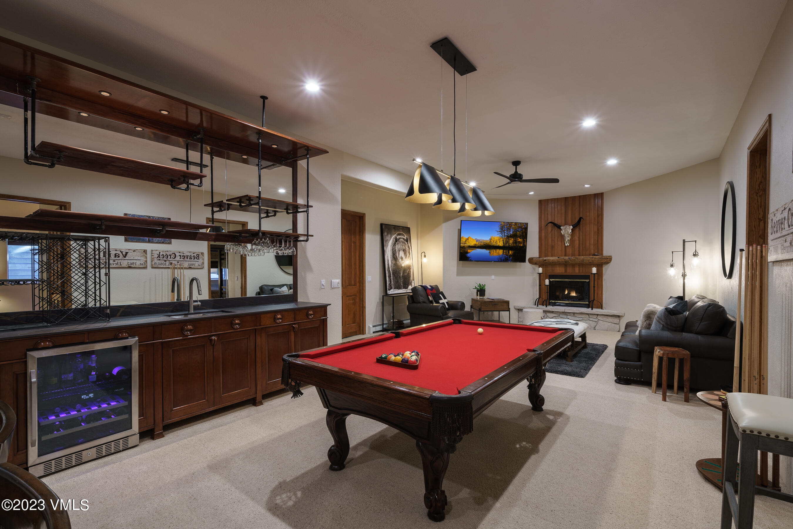 176 Windermere Circle Edwards, CO 81632 - Photo 39 of 42 a room with furniture pool table table tennis table and a fireplace