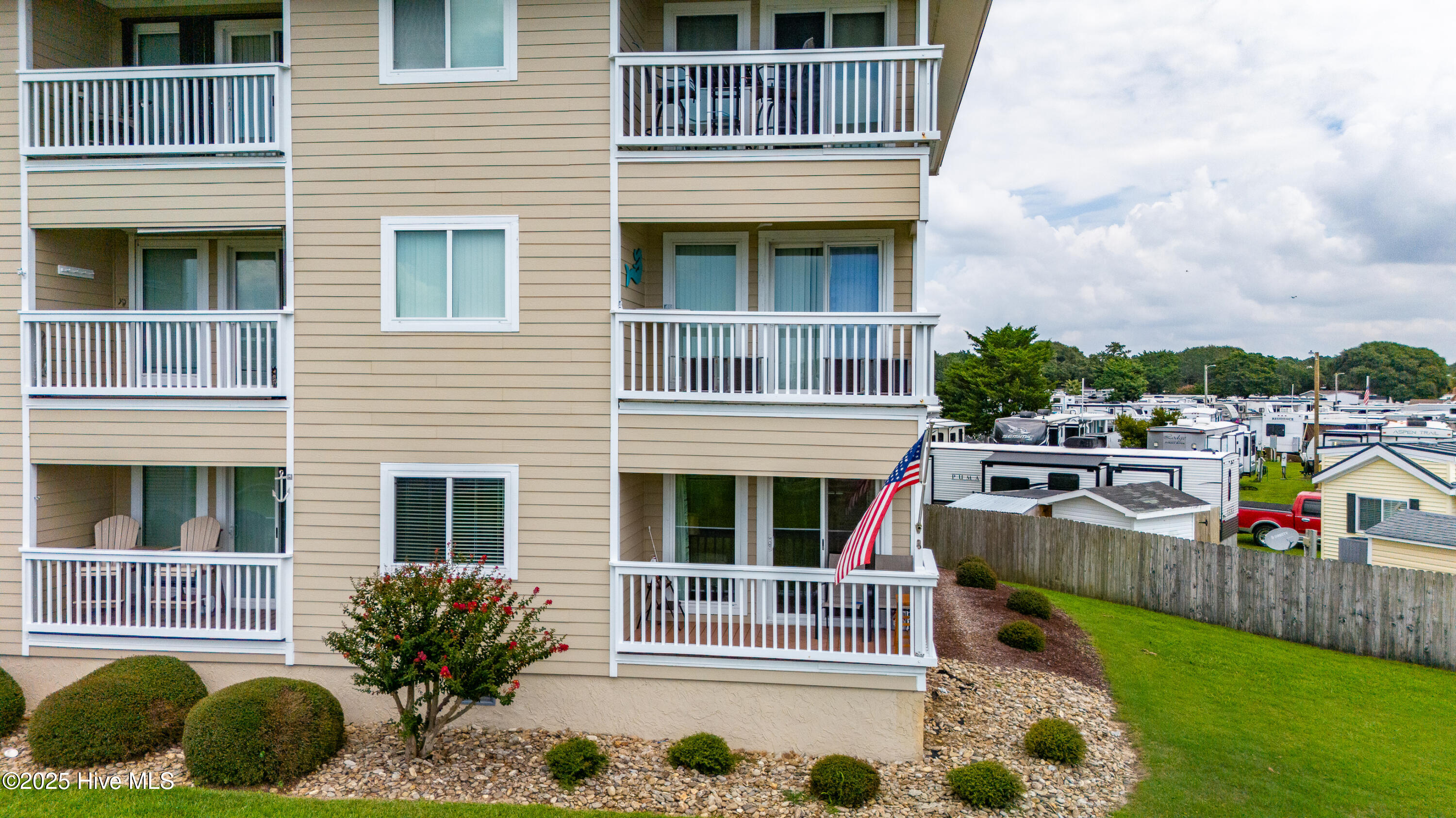 650 Cedar Point Boulevard, Unit B11 Cedar Point, NC 28584 - Photo 35 of 53 End unit with American Flag