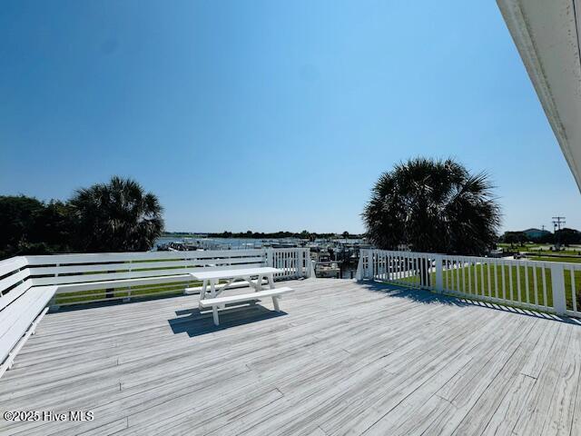 650 Cedar Point Boulevard, Unit B11 Cedar Point, NC 28584 - Photo 38 of 53 Club house deck and waterfront view great place to have a birthday, baby shower, gatherings!