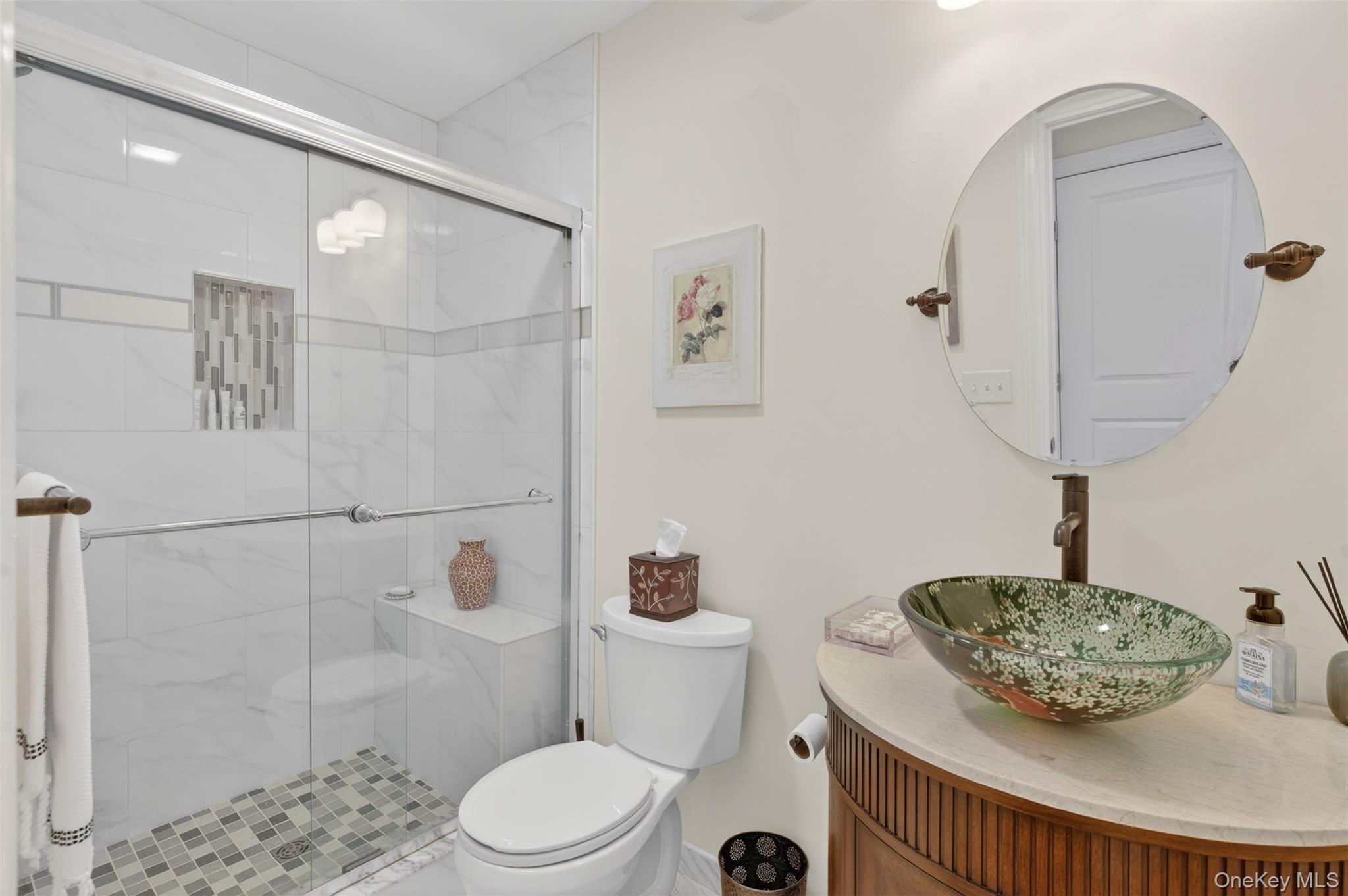 35 Kent Street Beacon, NY 12508 - Photo 20 of 40 The first-floor full bathroom is conveniently situated near the back bedroom and just past the kitchen.