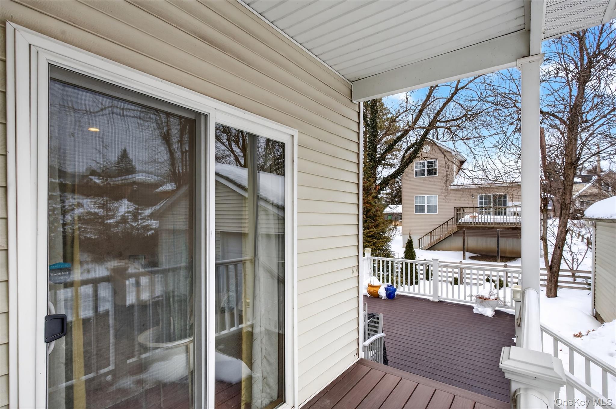 35 Kent Street Beacon, NY 12508 - Photo 23 of 40 A sliding glass door from the first-floor back bedroom provides direct access to the back deck and driveway.