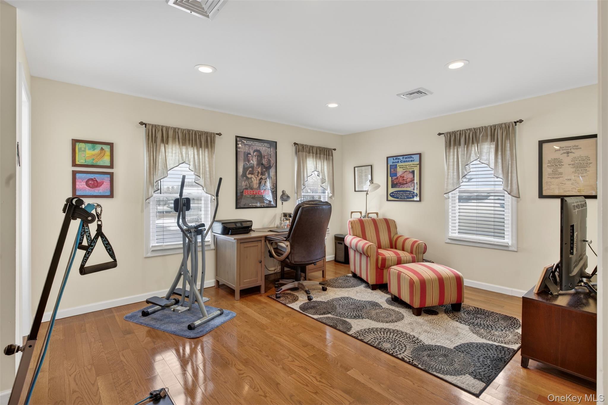 35 Kent Street Beacon, NY 12508 - Photo 23 of 42 a living room with furniture windows and a flat screen tv