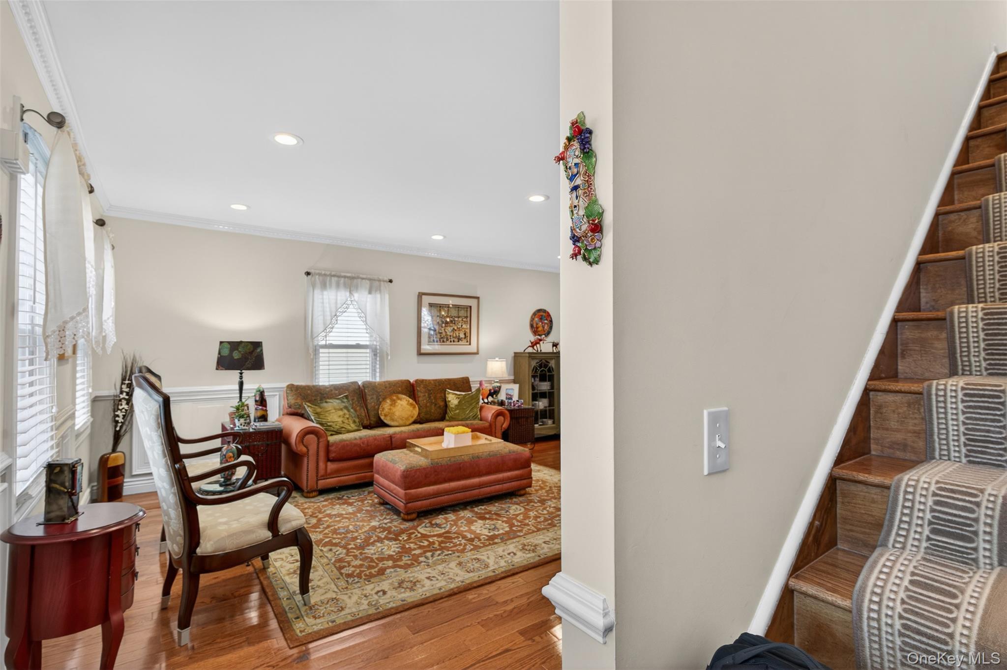 35 Kent Street Beacon, NY 12508 - Photo 26 of 40 A staircase connects the first floor to the second floor, offering a seamless flow between levels.