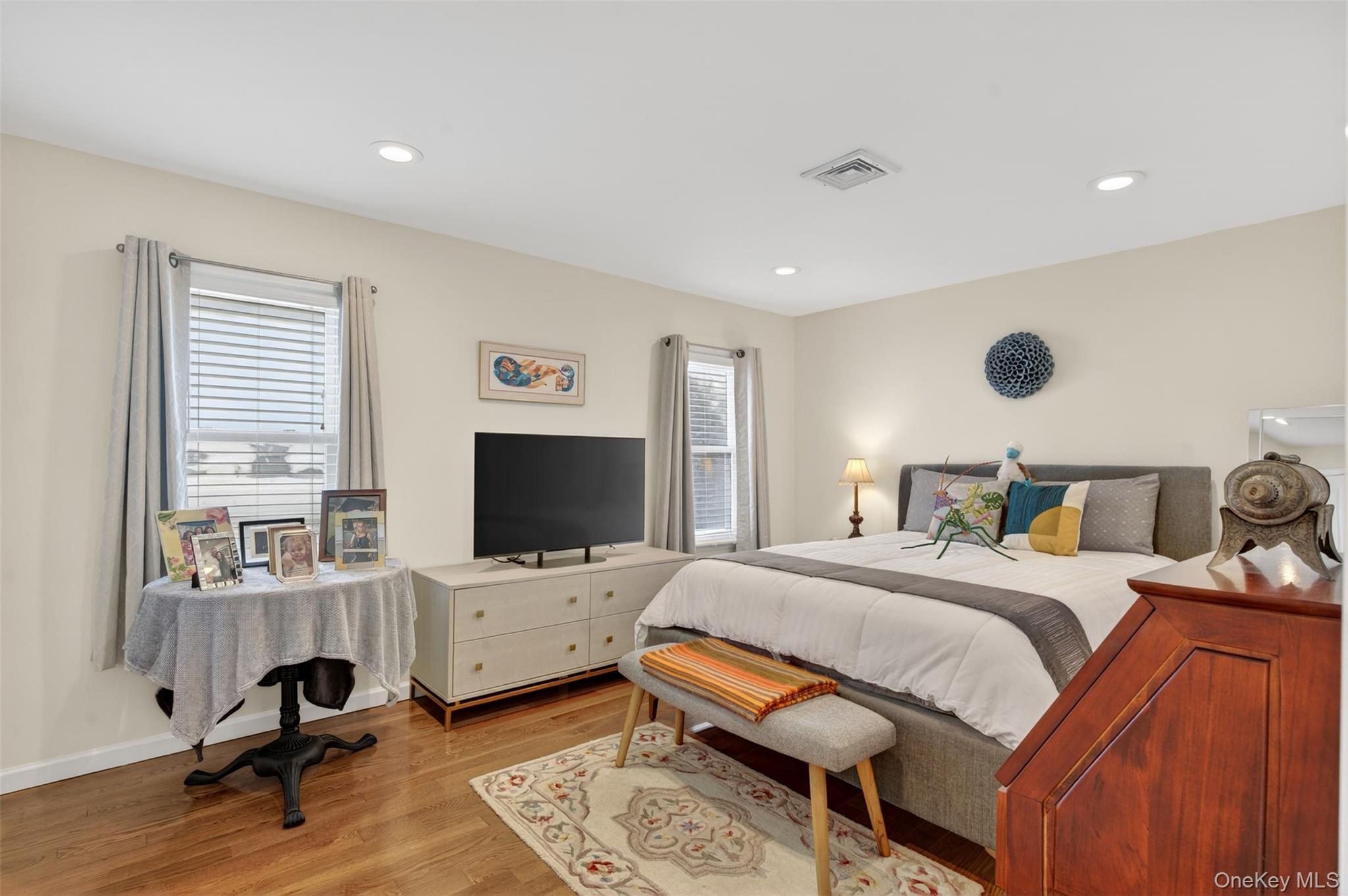 35 Kent Street Beacon, NY 12508 - Photo 26 of 42 a bedroom with a bed and wooden floor