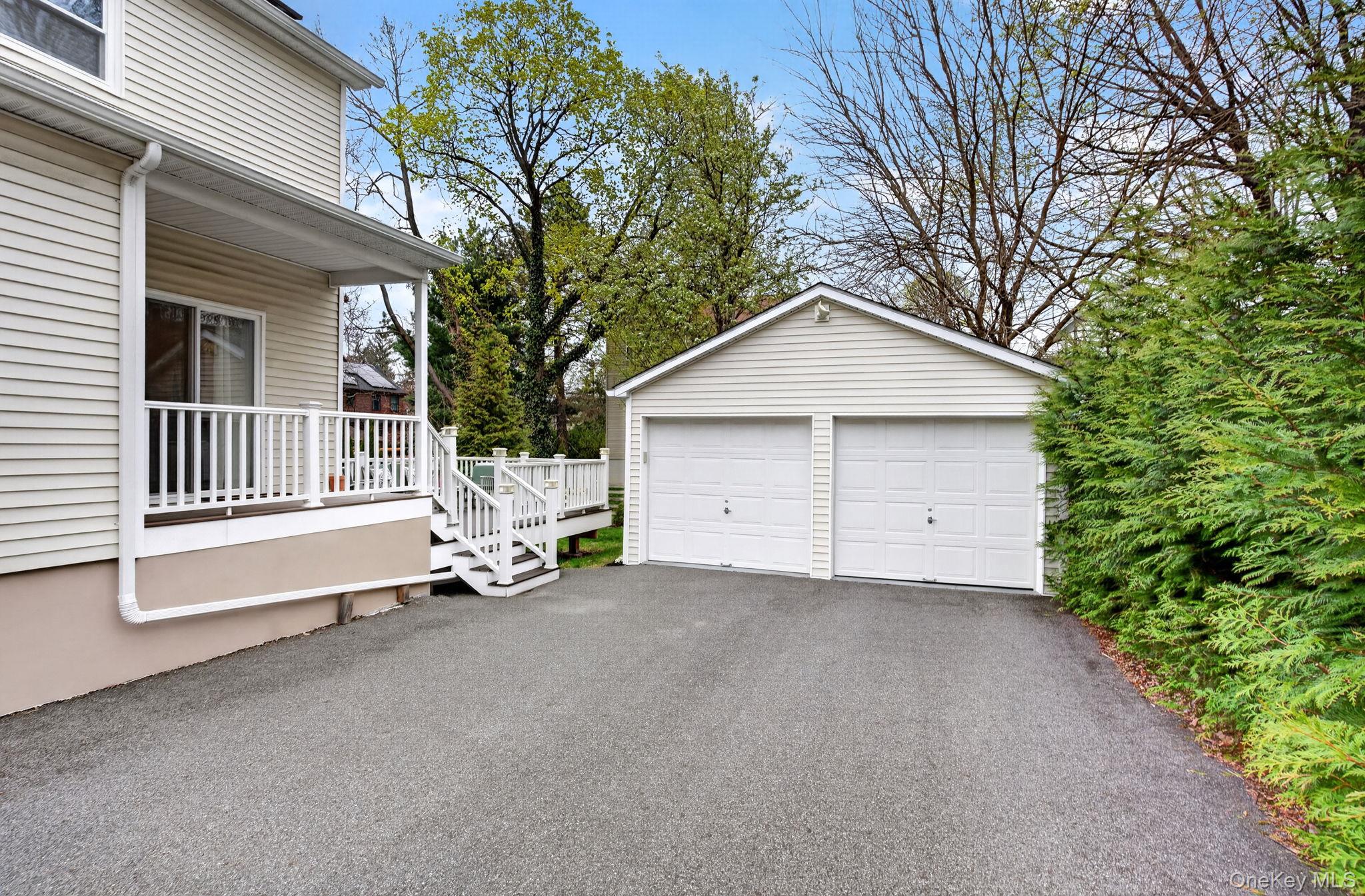 35 Kent Street Beacon, NY 12508 - Photo 31 of 42 a view of a house with a yard and garage