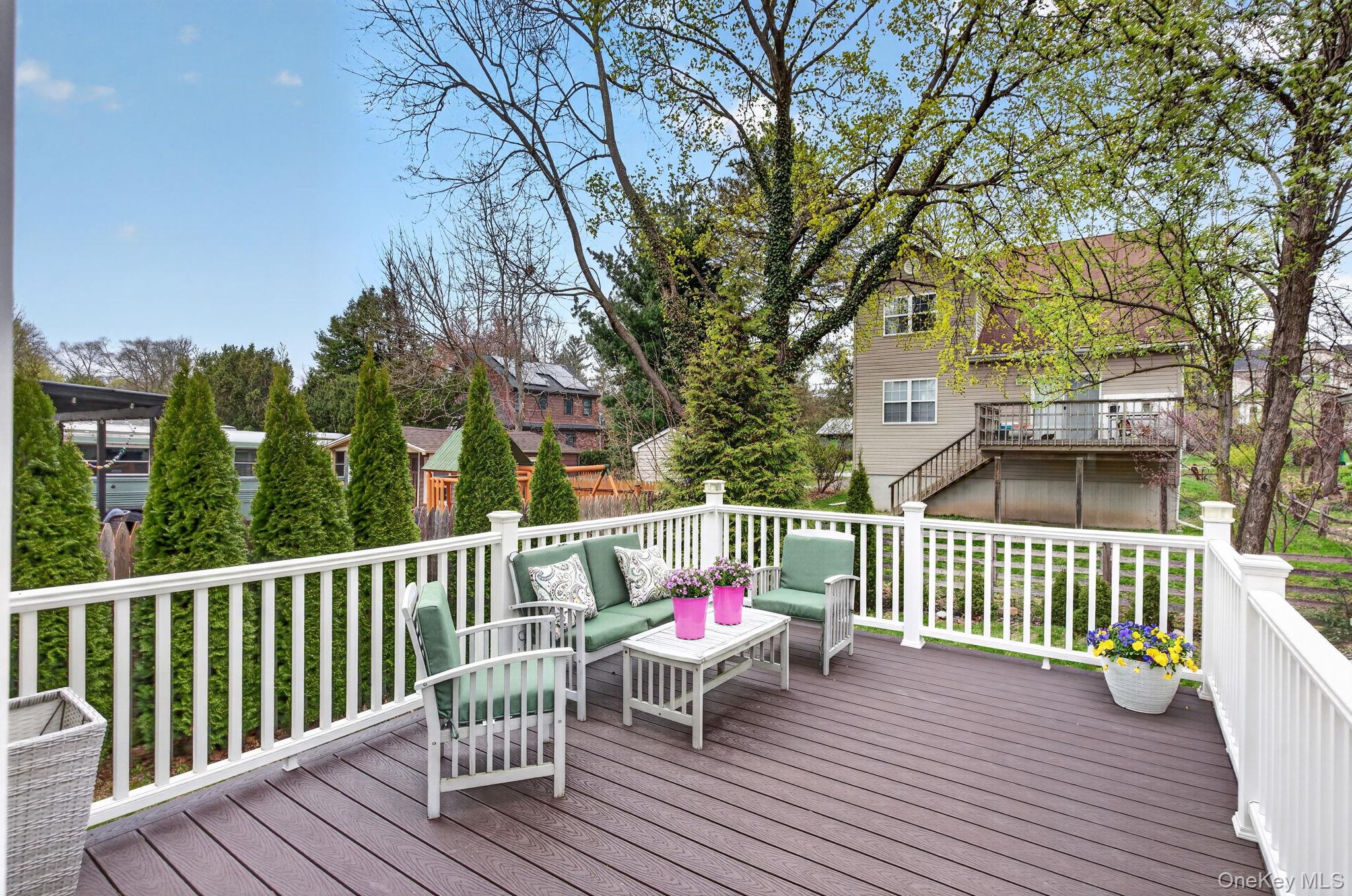 35 Kent Street Beacon, NY 12508 - Photo 32 of 42 a view of a deck with a bench and wooden floor