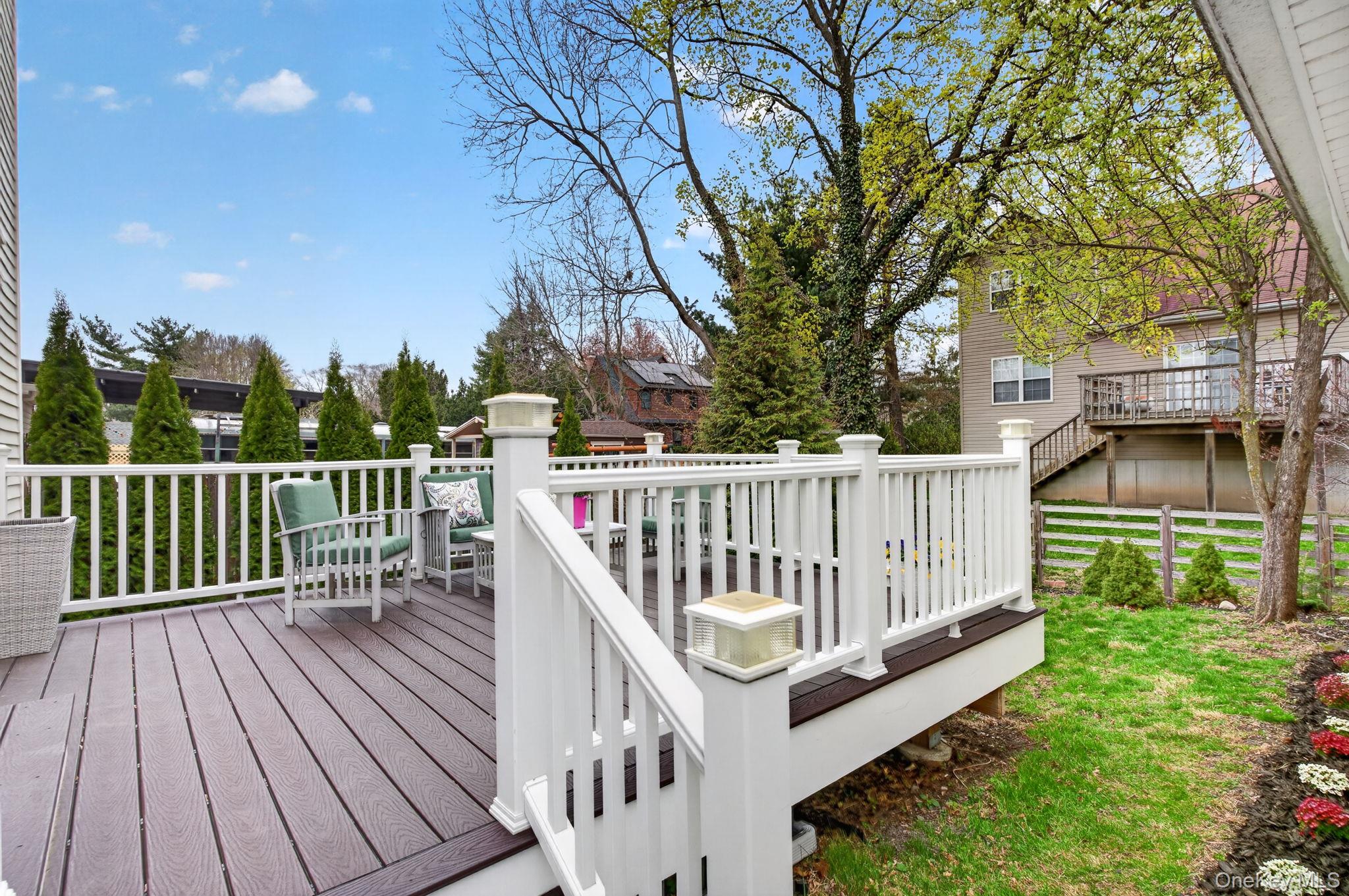 35 Kent Street Beacon, NY 12508 - Photo 34 of 42 a view of a wooden deck and a yard with wooden fence