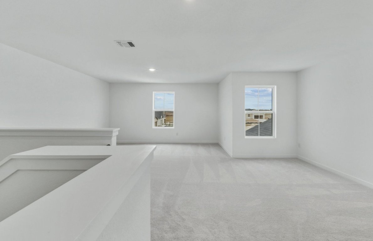 337 Sullivan Way Elgin, TX 78621 - Photo 13 of 25 an empty room with windows