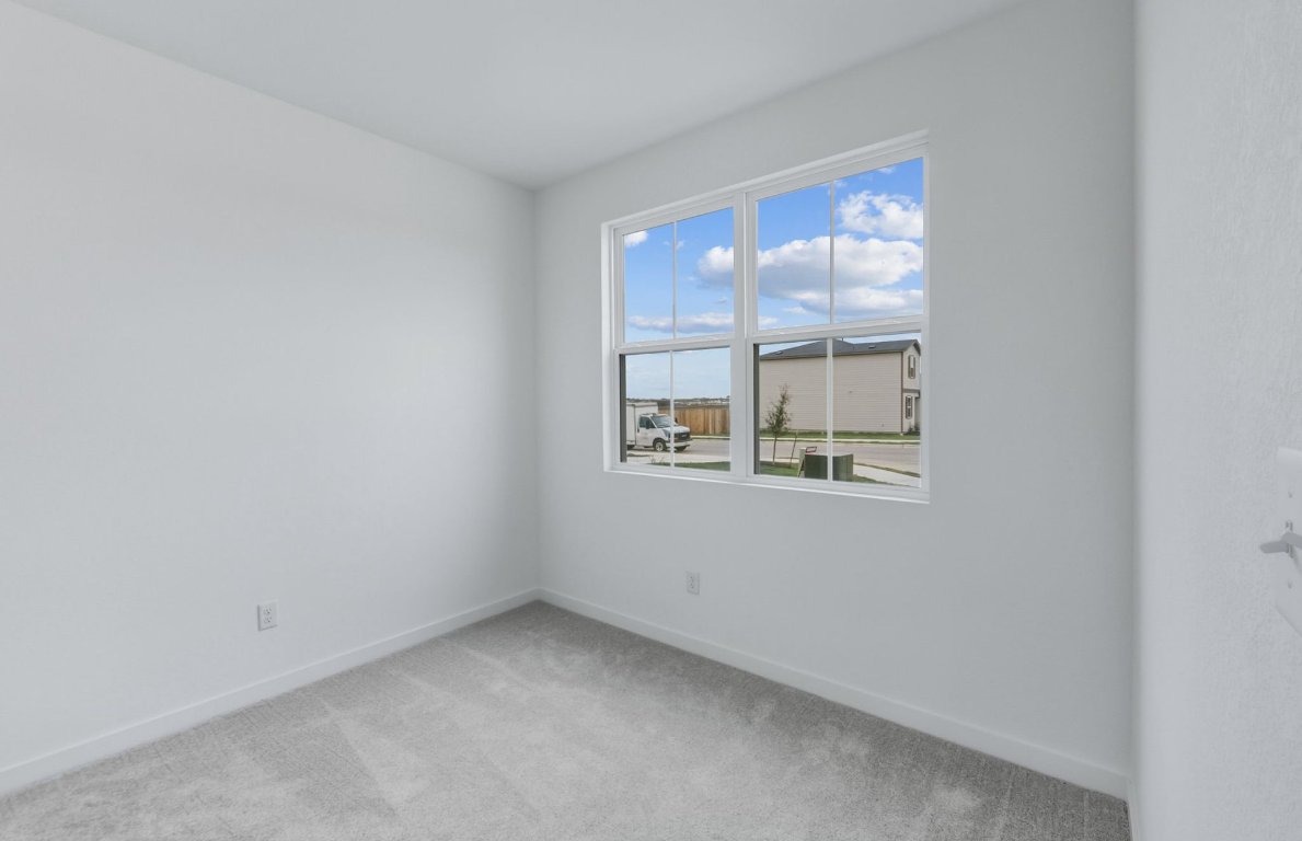 337 Sullivan Way Elgin, TX 78621 - Photo 15 of 25 an empty room with windows