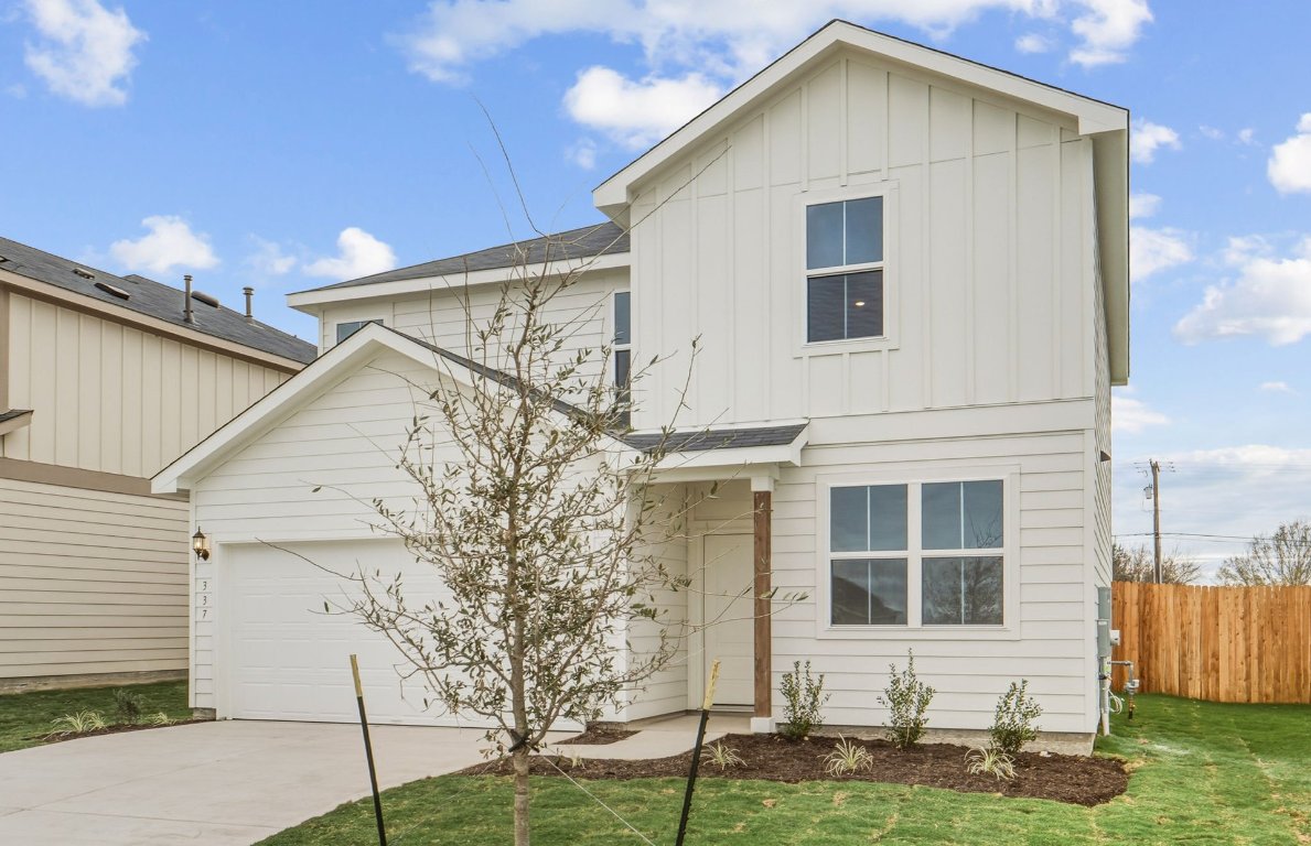 337 Sullivan Way Elgin, TX 78621 - Photo 2 of 25 a view of a house with a yard