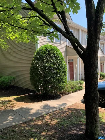 a view of a backyard of the house