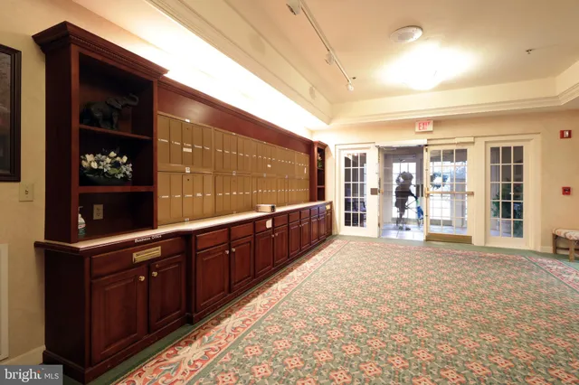 a view of a living room and kitchen