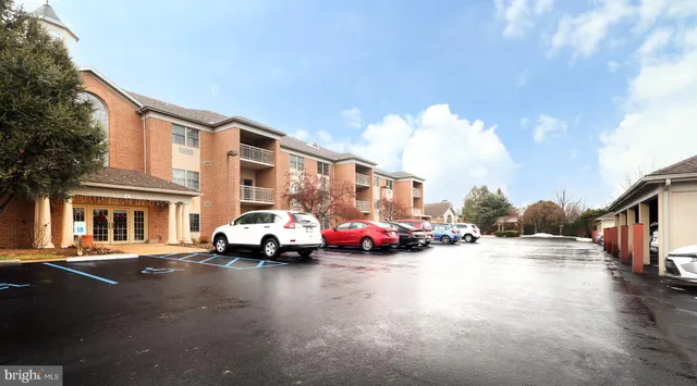 a front view of a building with street view