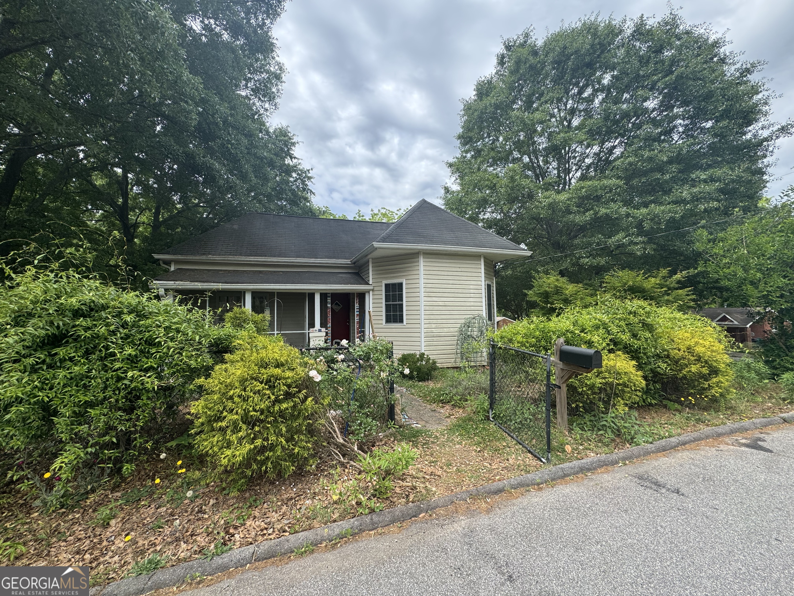 1734 East Broad Street, Unit A Athens, GA 30601 - Photo 2 of 20 a front view of house with yard and green space