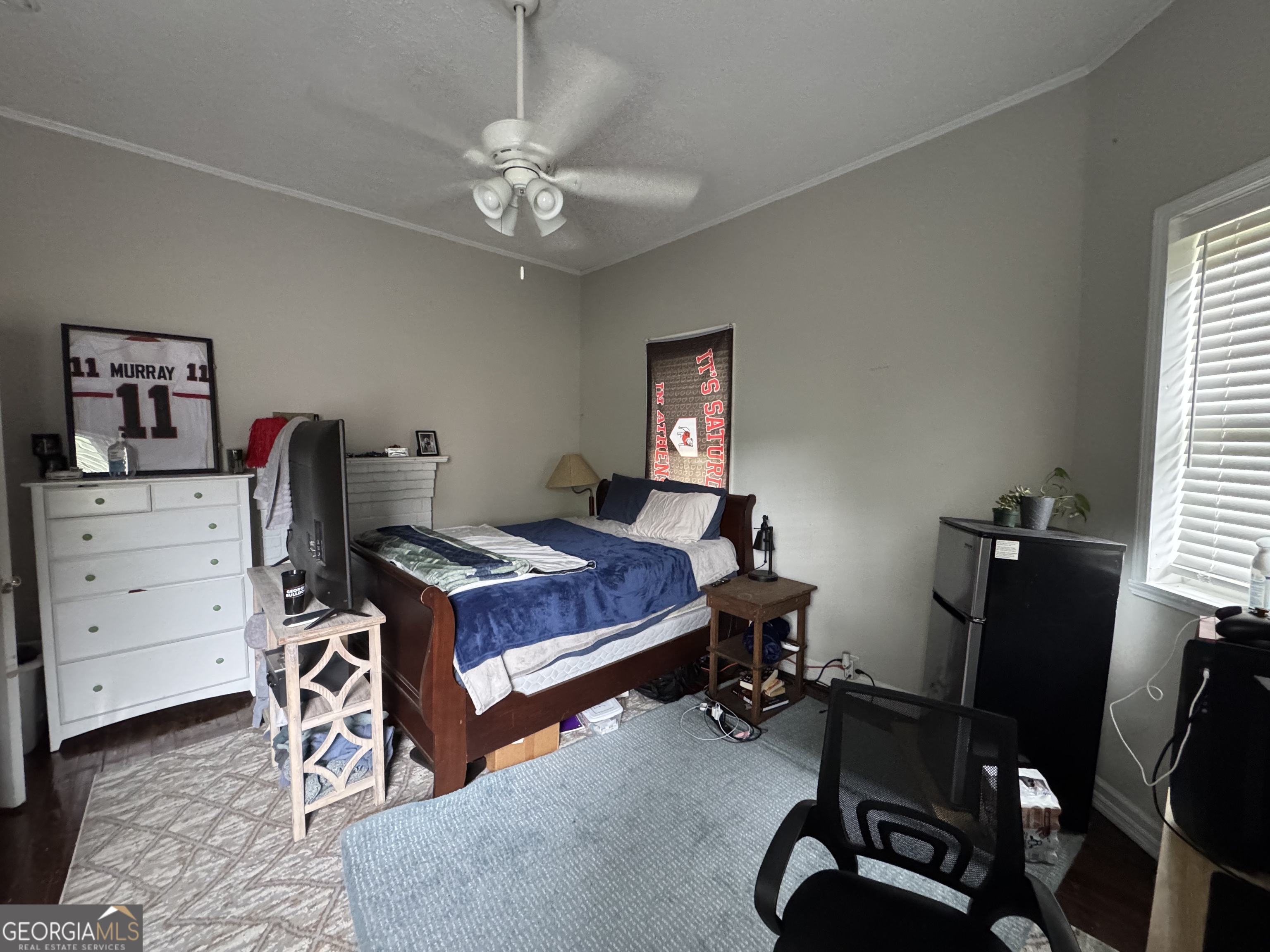 1734 East Broad Street, Unit A Athens, GA 30601 - Photo 3 of 20 a bedroom with a bed and a desk