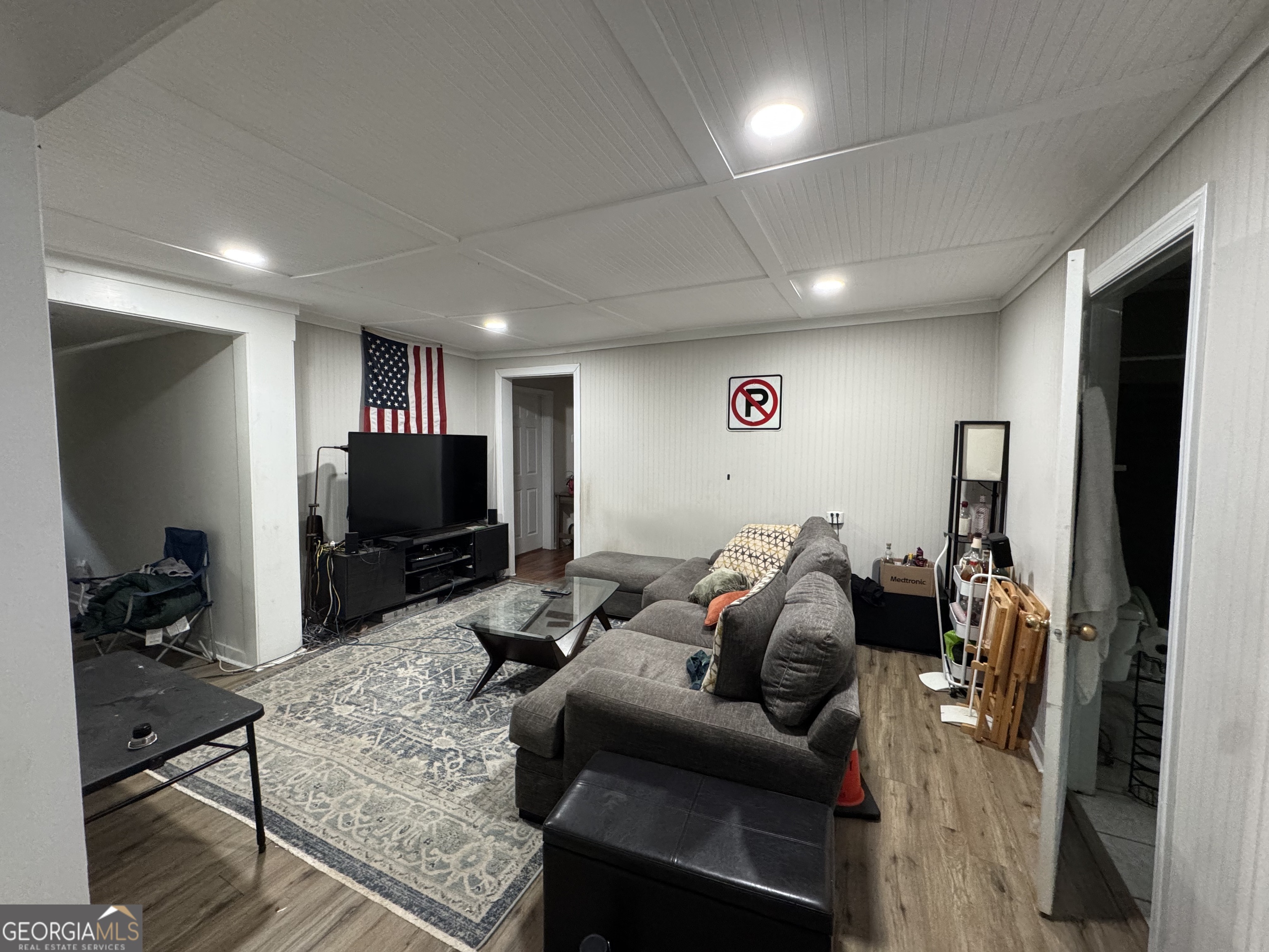 1734 East Broad Street, Unit A Athens, GA 30601 - Photo 7 of 20 a living room with furniture and a flat screen tv