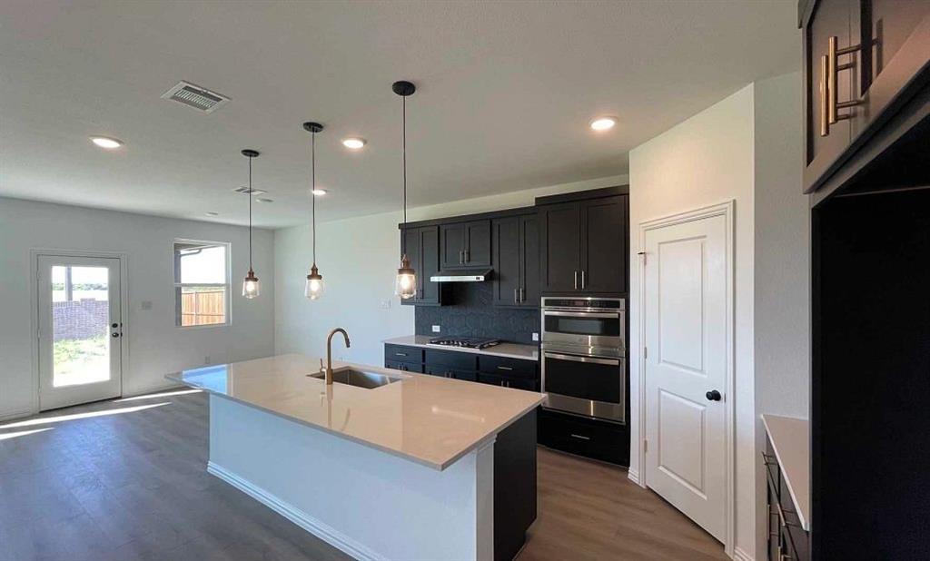 1512 Abbott Crk Road Celina, TX 75009 - Photo 12 of 31 Kitchen Construction Progress featuring the Noir Collection