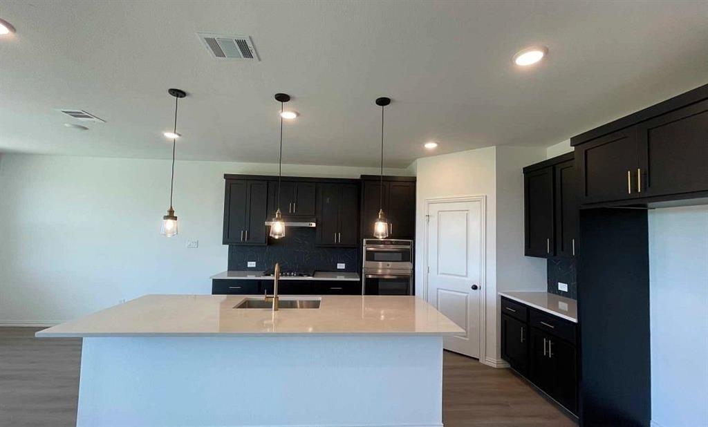 1512 Abbott Crk Road Celina, TX 75009 - Photo 13 of 31 Kitchen Construction Progress featuring the Noir Collection