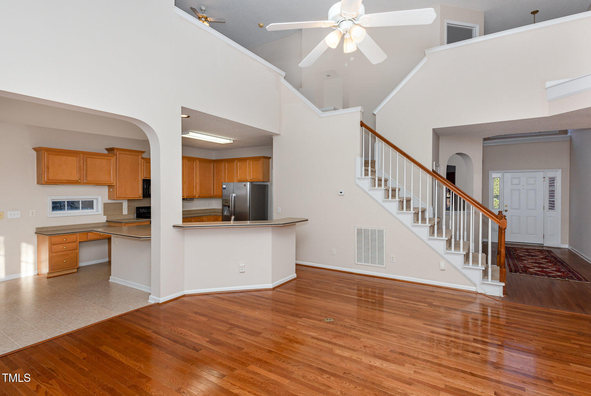 3100 Lariat Ridge Drive Wake Forest, NC 27587 - Photo 6 of 28 Entrance, Living Room, & Kitchen