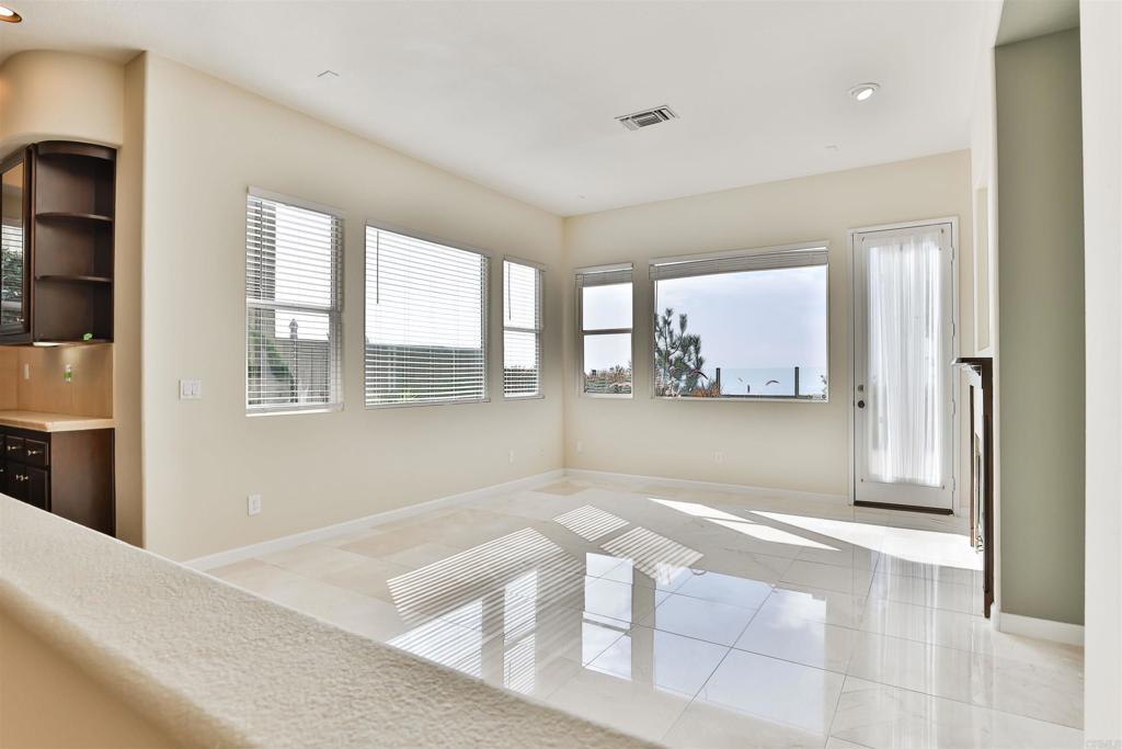 11477 Miro Circle San Diego, CA 92131 - Photo 11 of 36 a view of an empty room with a window