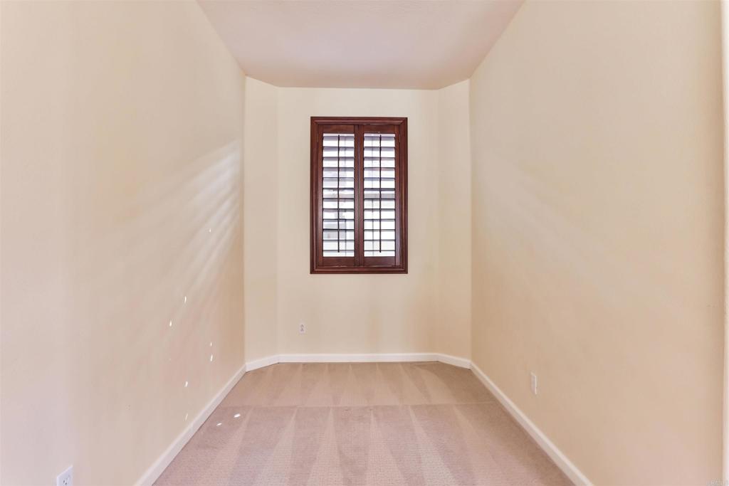 11477 Miro Circle San Diego, CA 92131 - Photo 15 of 36 a view of an empty room with a window