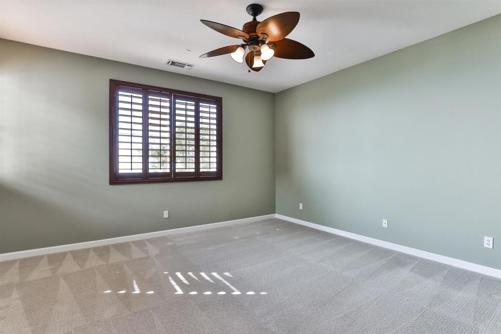 11477 Miro Circle San Diego, CA 92131 - Photo 17 of 36 a view of an empty room with a window
