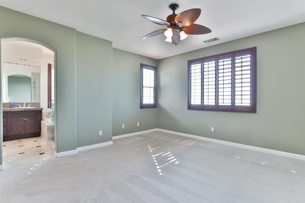 11477 Miro Circle San Diego, CA 92131 - Photo 18 of 36 a view of an empty room with a window