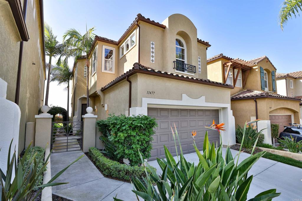 11477 Miro Circle San Diego, CA 92131 - Photo 30 of 36 a front view of a house with garden