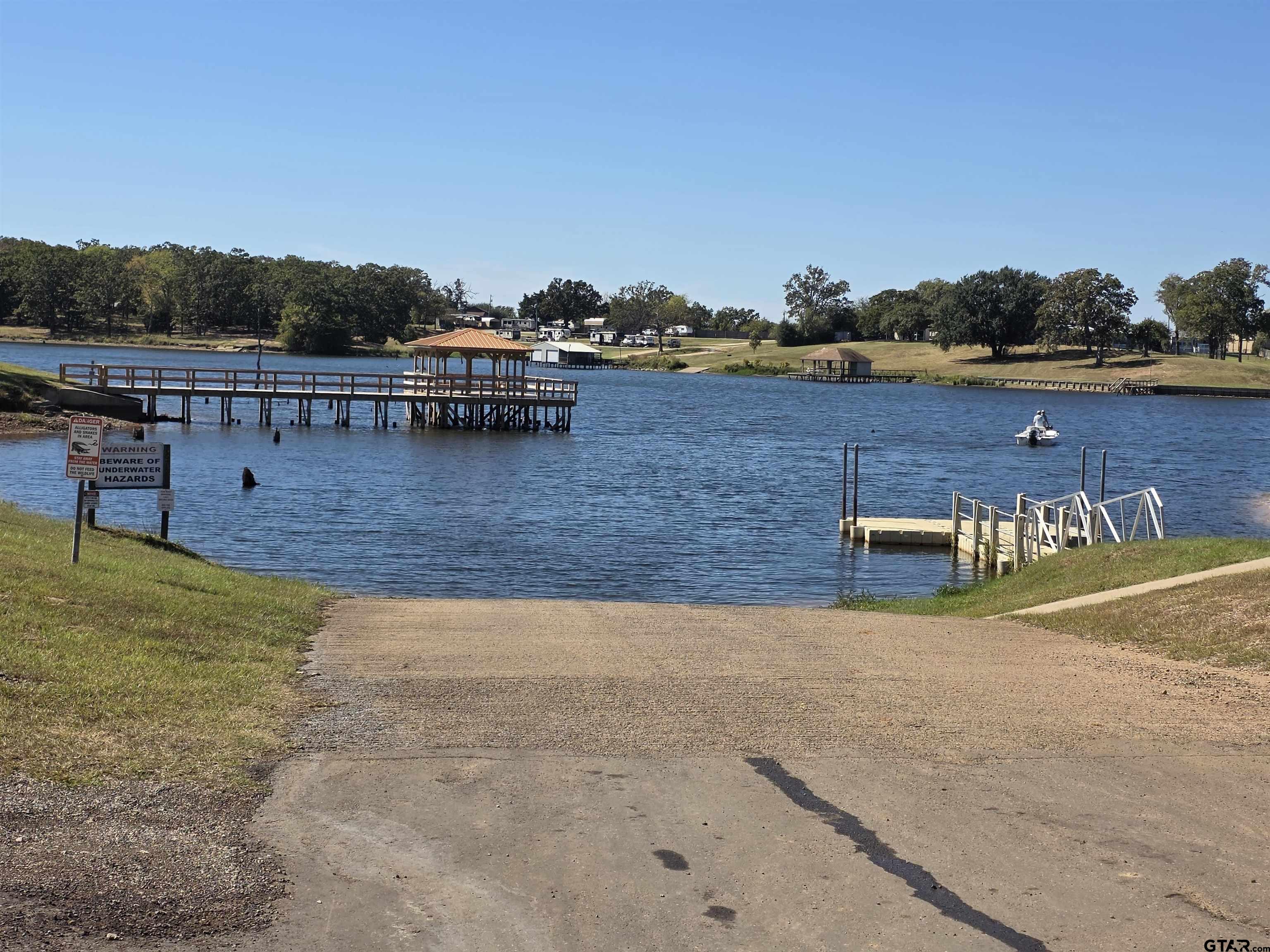 281 Sioux Quitman, TX 75783 - Photo 28 of 33 a view of a lake with a mountain view