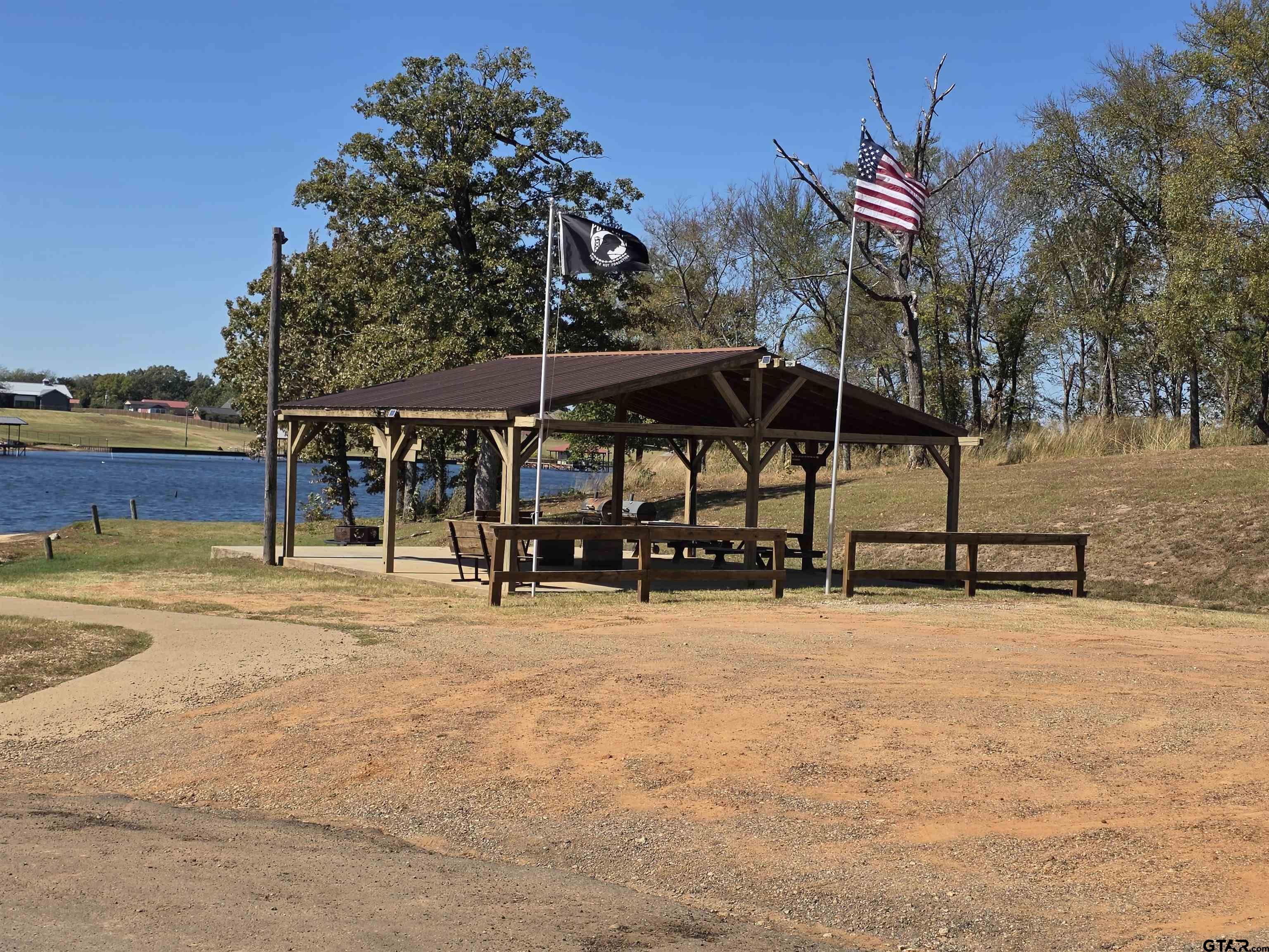 281 Sioux Quitman, TX 75783 - Photo 30 of 33 a view of a swimming pool with a patio