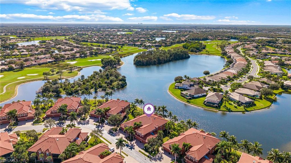 6418 Legacy Circle, Unit 802 Naples, FL 34113 - Photo 30 of 47 an aerial view of residential houses with outdoor space