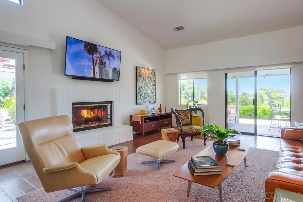 924 Ridge Heights Drive Fallbrook, CA 92028 - Photo 13 of 75 a living room with furniture fireplace and a large window