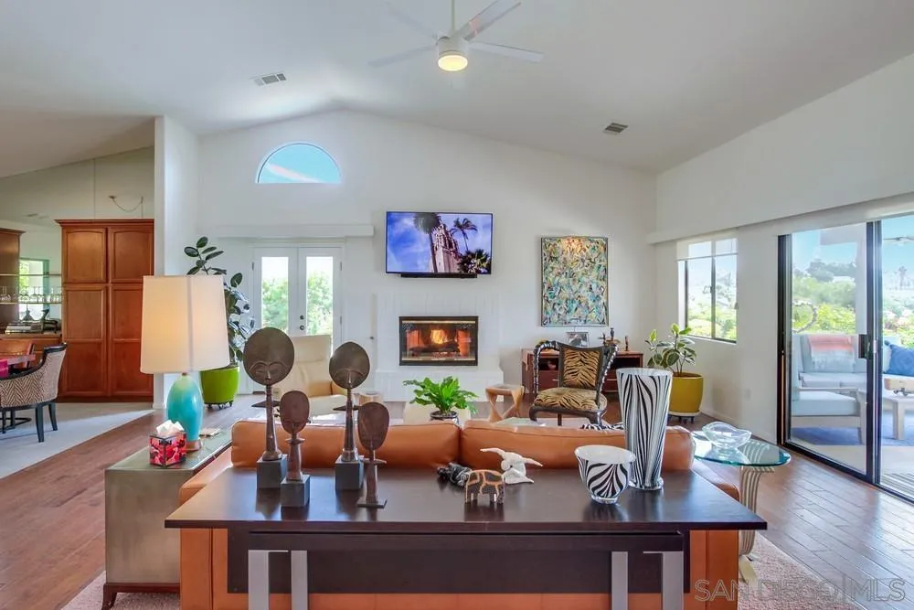 924 Ridge Heights Drive Fallbrook, CA 92028 - Photo 15 of 75 a living room with fireplace furniture and a large window