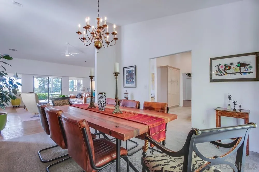 924 Ridge Heights Drive Fallbrook, CA 92028 - Photo 21 of 75 a view of a dining room with furniture and chandelier