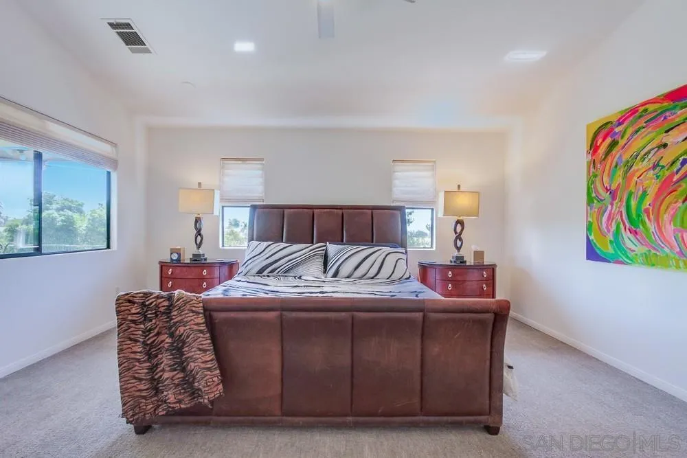 924 Ridge Heights Drive Fallbrook, CA 92028 - Photo 41 of 75 a bed sitting in a bedroom next to a window