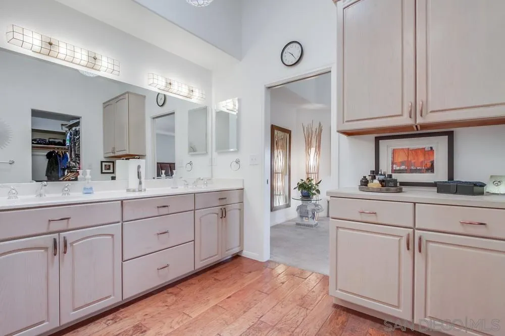 924 Ridge Heights Drive Fallbrook, CA 92028 - Photo 45 of 75 a spacious bathroom with double sink and a mirror