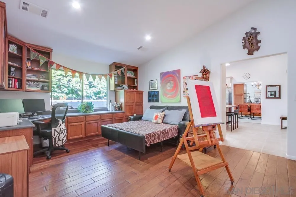 924 Ridge Heights Drive Fallbrook, CA 92028 - Photo 49 of 75 a living room with patio furniture and a wooden floor