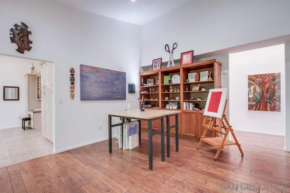 924 Ridge Heights Drive Fallbrook, CA 92028 - Photo 51 of 75 a view of a workspace with furniture and wooden floor