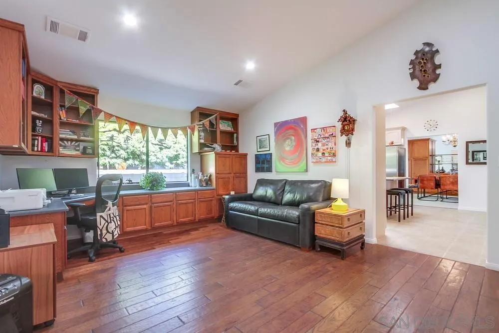 924 Ridge Heights Drive Fallbrook, CA 92028 - Photo 54 of 75 a living room with furniture and a wooden floor