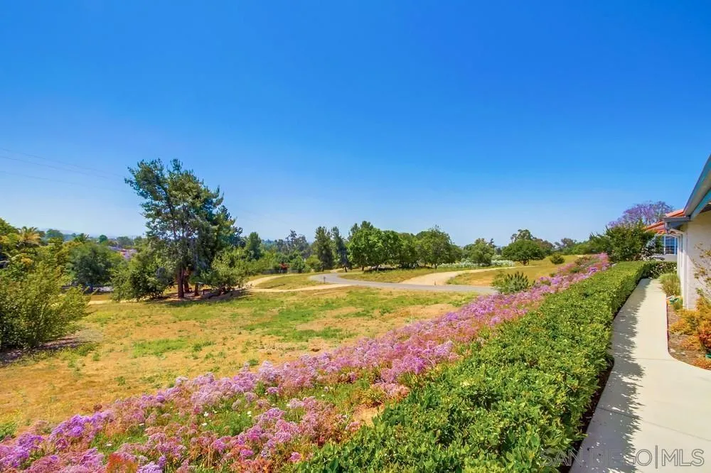 924 Ridge Heights Drive Fallbrook, CA 92028 - Photo 68 of 75 a view of a lake with a house in the background