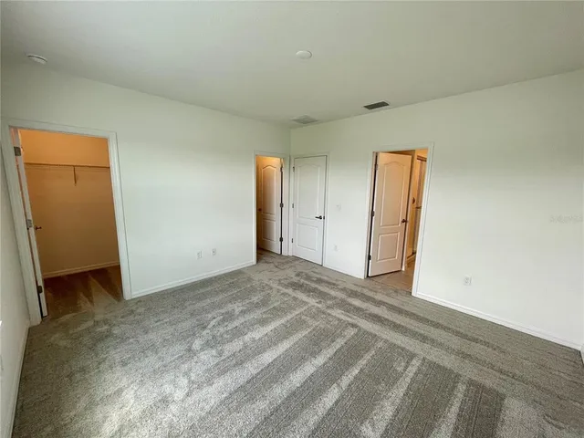 a view of a room with an empty space