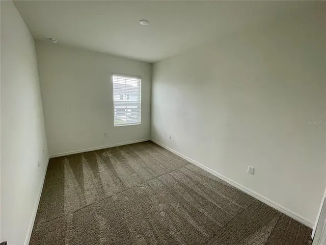 an empty room with window