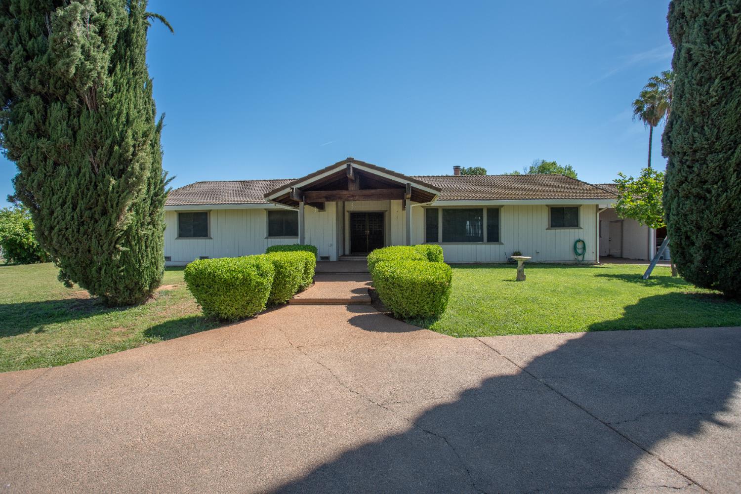 6323 Excelsior Road Sacramento, CA 95830 - Photo 2 of 75 a view of a house with a yard