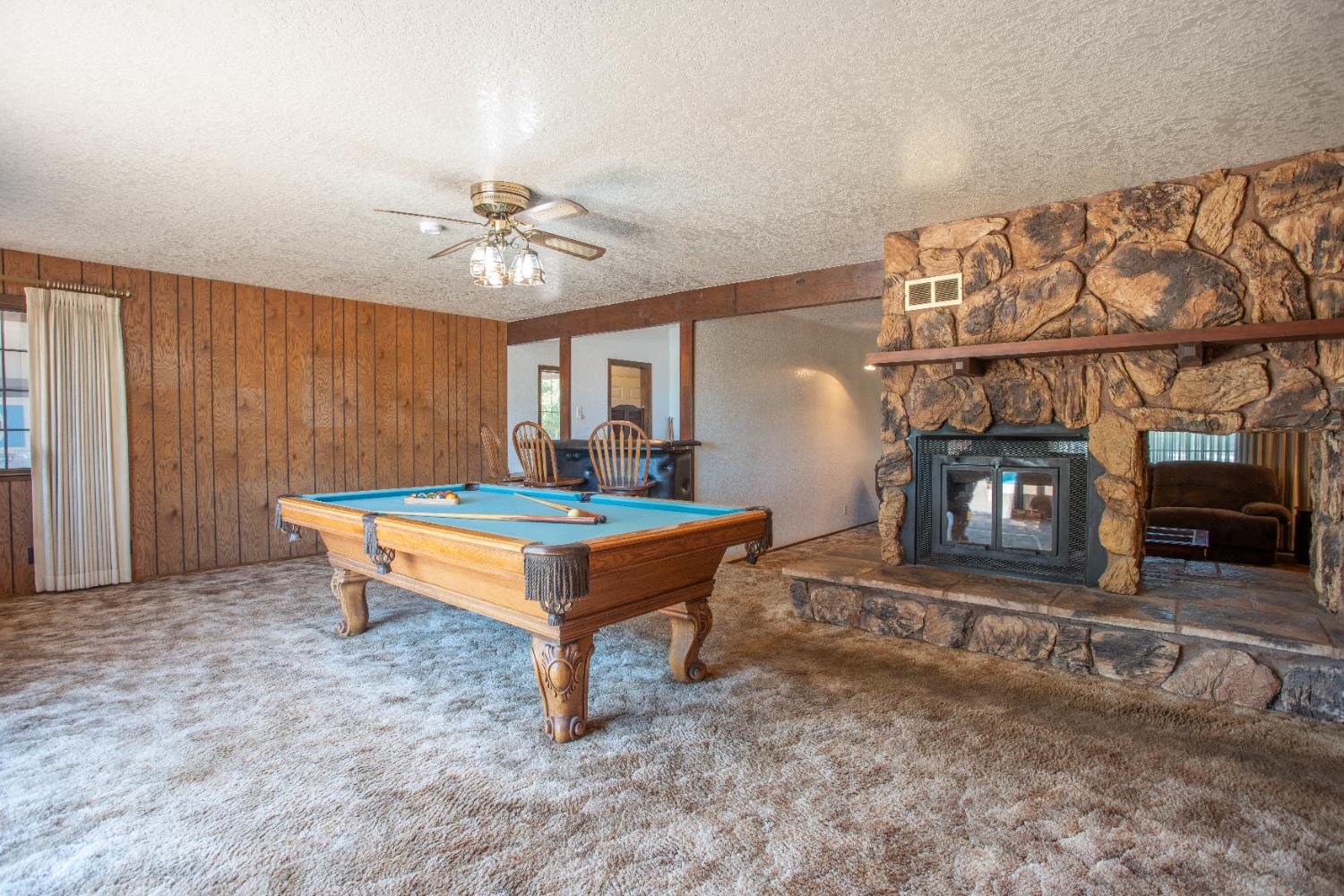 6323 Excelsior Road Sacramento, CA 95830 - Photo 24 of 75 a room with pool table and windows