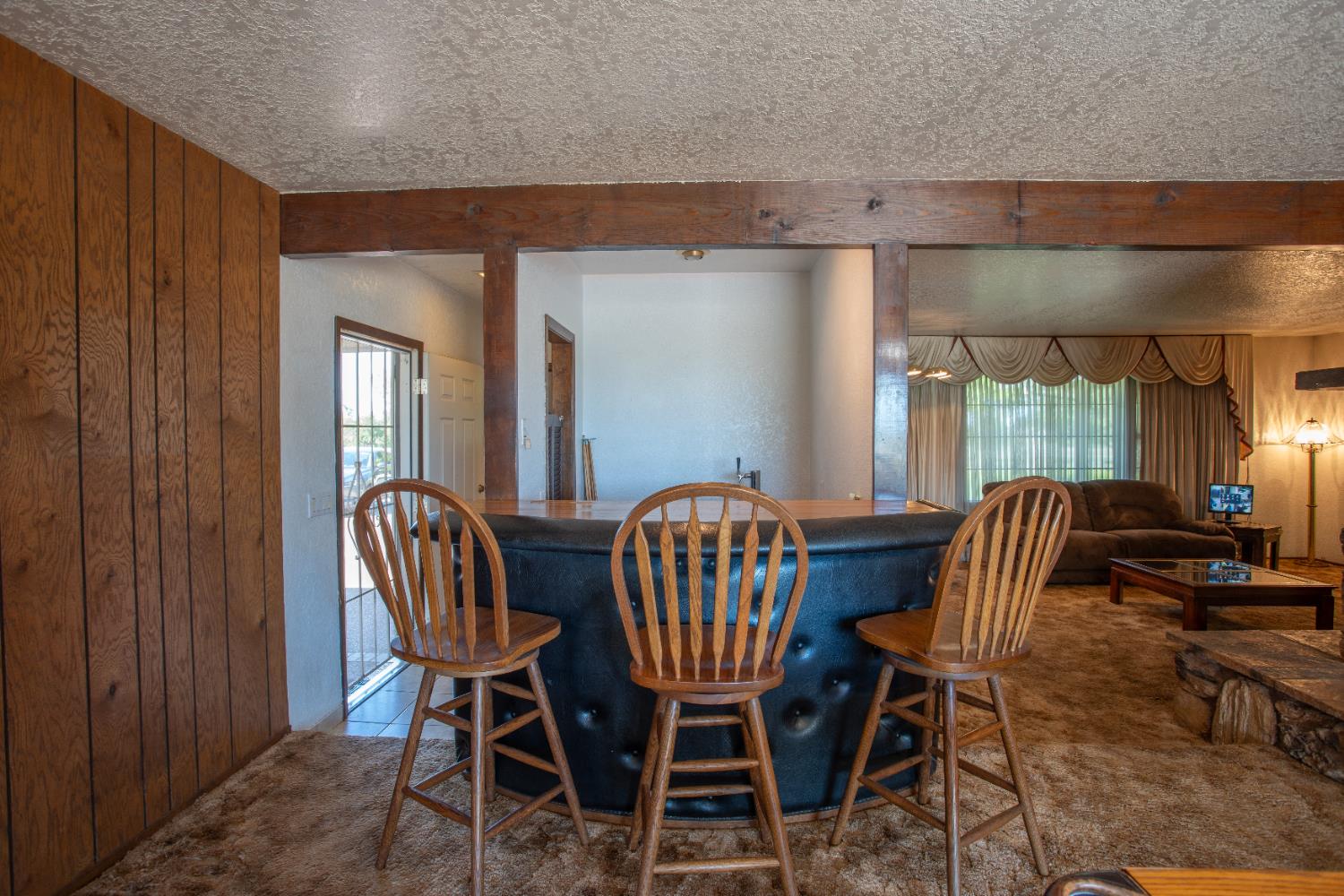 6323 Excelsior Road Sacramento, CA 95830 - Photo 25 of 75 a view of a dining room with furniture and window