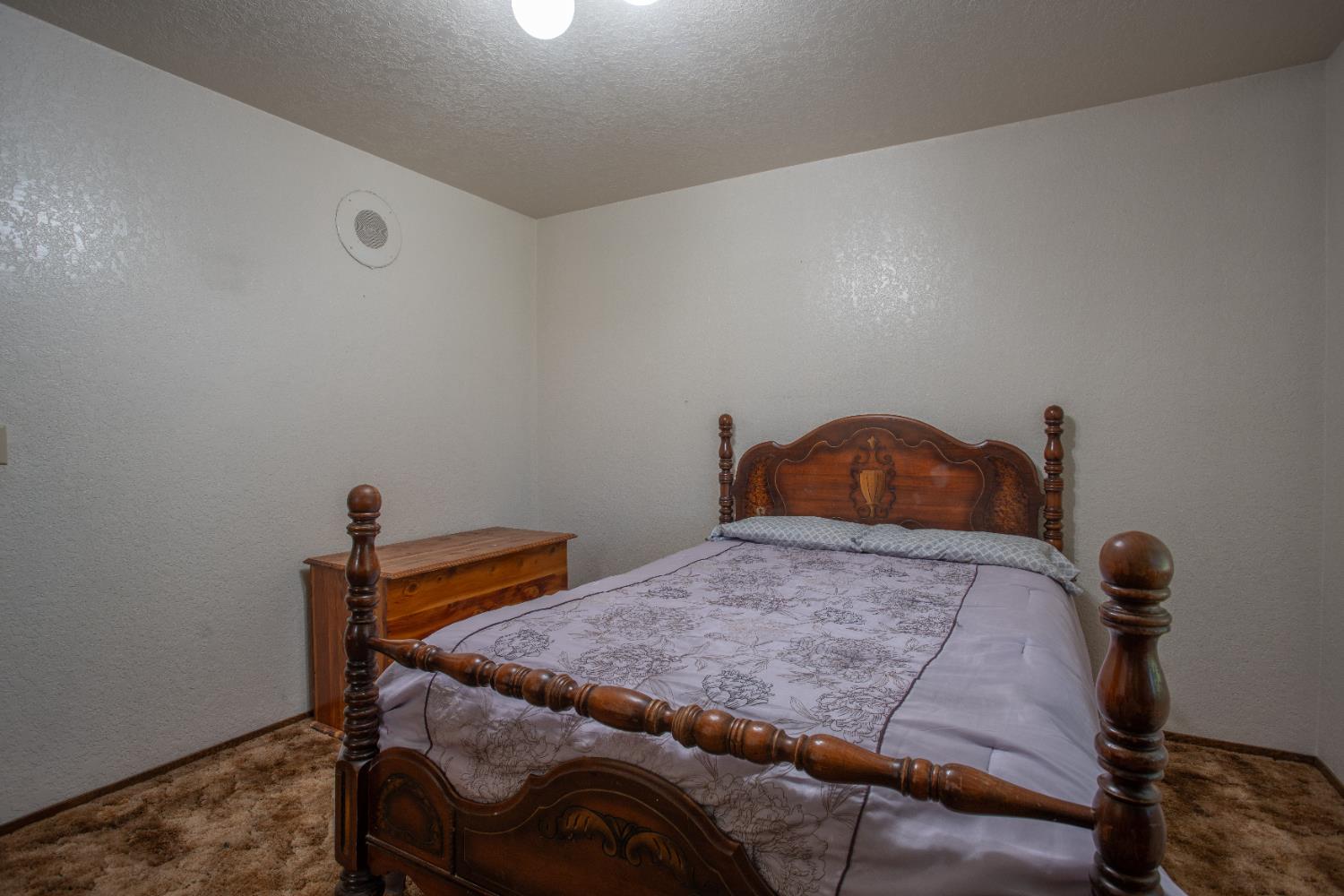 6323 Excelsior Road Sacramento, CA 95830 - Photo 28 of 75 a bedroom with a bed and a window