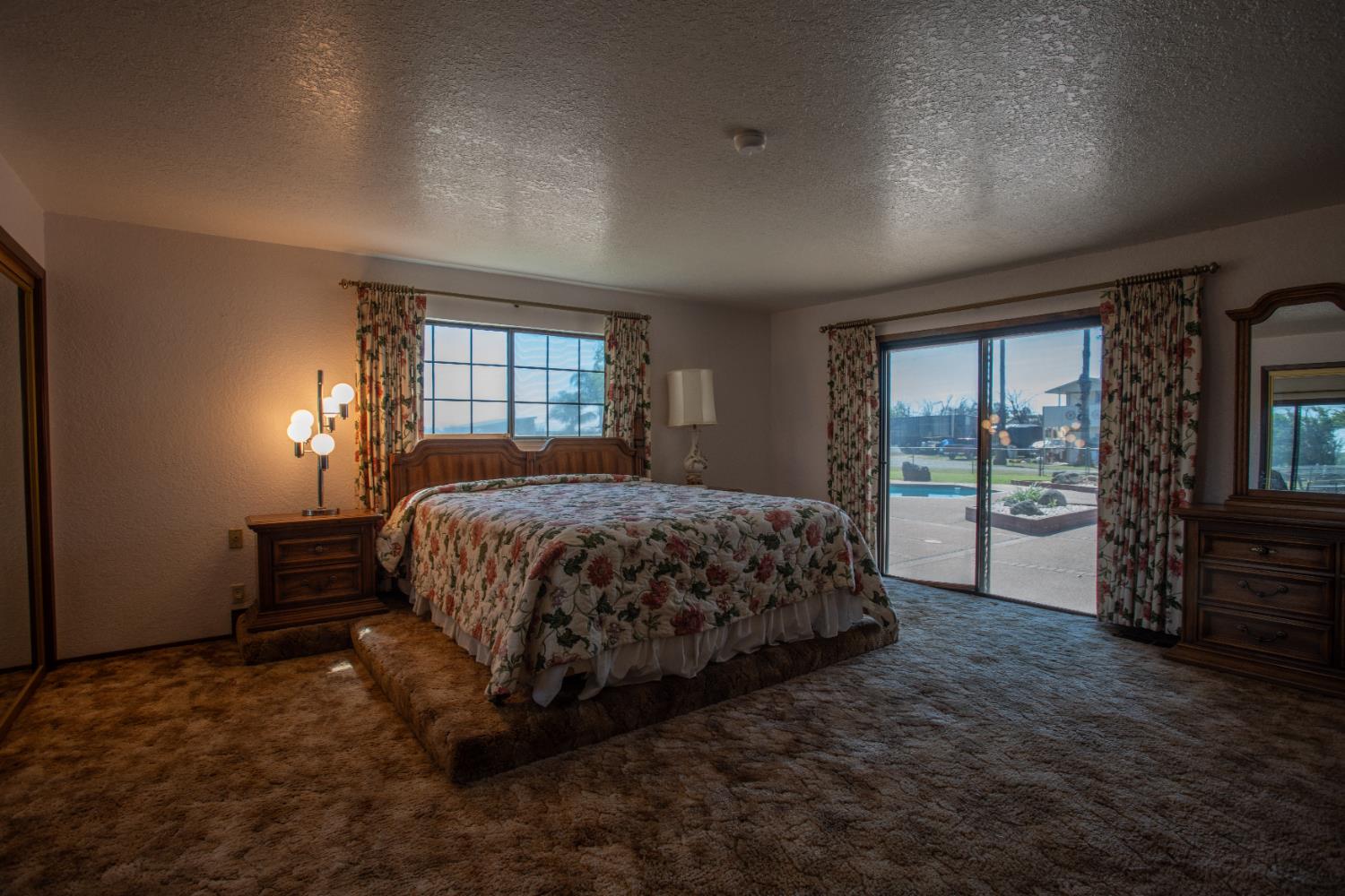6323 Excelsior Road Sacramento, CA 95830 - Photo 35 of 75 a bedroom with a bed and large window